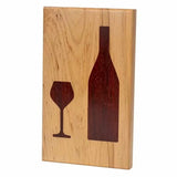 Wooden cutting board with inlaid wine bottle and glass silhouettes, woodworking project