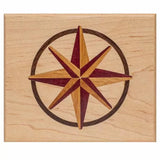 Wood inlay compass rose star design on light maple panel, ideal for woodworking projects