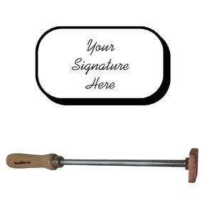 Custom wood branding iron with wooden handle and a sample signature plaque