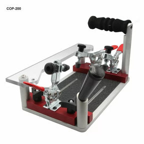 Woodworking jig with toggle clamps, handle, and non-slip base on white background