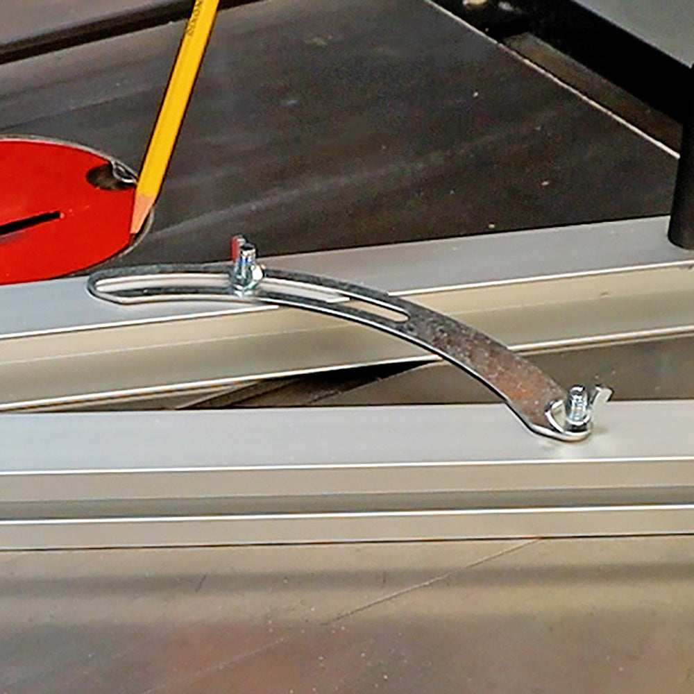 Curved metal woodworking jig for marking on a table saw fence with a pencil