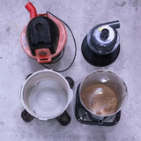Shop vacuum and dust separator lids with empty dust collection bins on a concrete floor