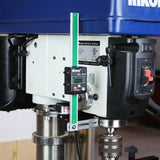 Drill press with digital depth gauge mounted for precision woodworking measurements