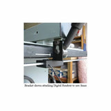 Bracket attaching digital readout sensor to a table saw fence in a workshop setting