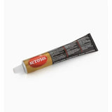 Tube of Autosol metal polishing paste for woodworking tools on white background
