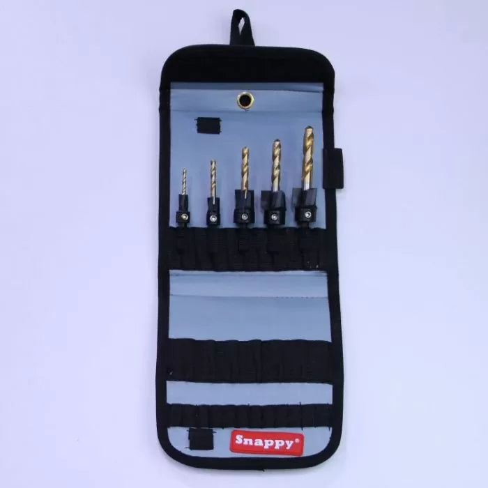 Drill bit set with five hex shank bits in a blue tool roll, woodworking accessory.