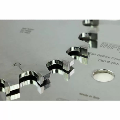 Close-up of precision saw blade teeth for woodworking, flat-bottom crosscut design