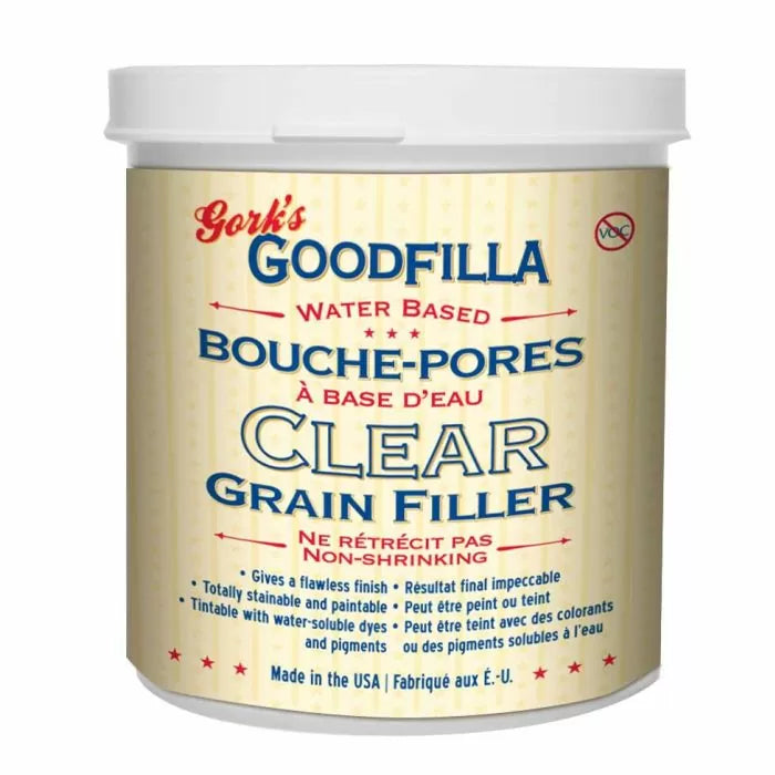 Clear water-based grain filler container for woodworking, labeled Goodfilla, non-shrinking formula