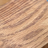 Close-up of wood grain on a filled hardwood surface for woodworking repair