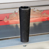 Black replacement table saw handle grip on metal saw surface with blade in background