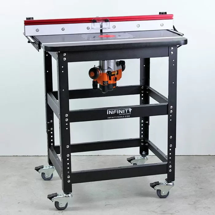Router table with adjustable fence, mounted router, and caster wheels for woodworking.