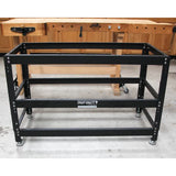 Heavy-duty adjustable steel router table stand frame with leveling feet in a workshop