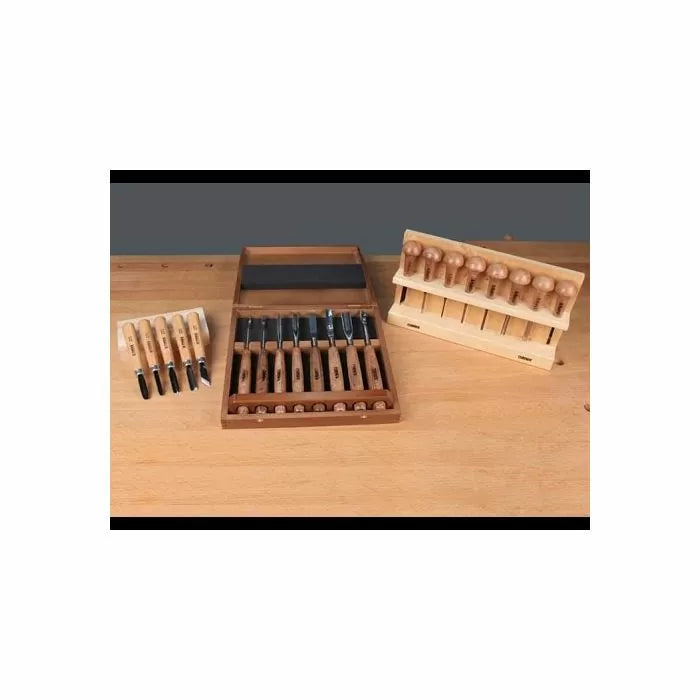 Woodworking chisel and carving tool sets with wooden handles on a workbench