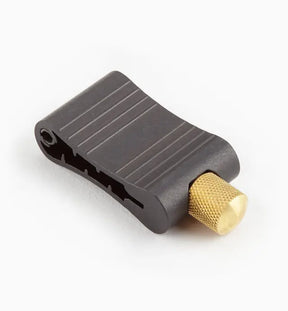 Black and brass woodworking tool fence stop for router table or saw guide rail
