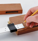 Marking wood with pencil and precision marking gauge for woodworking projects