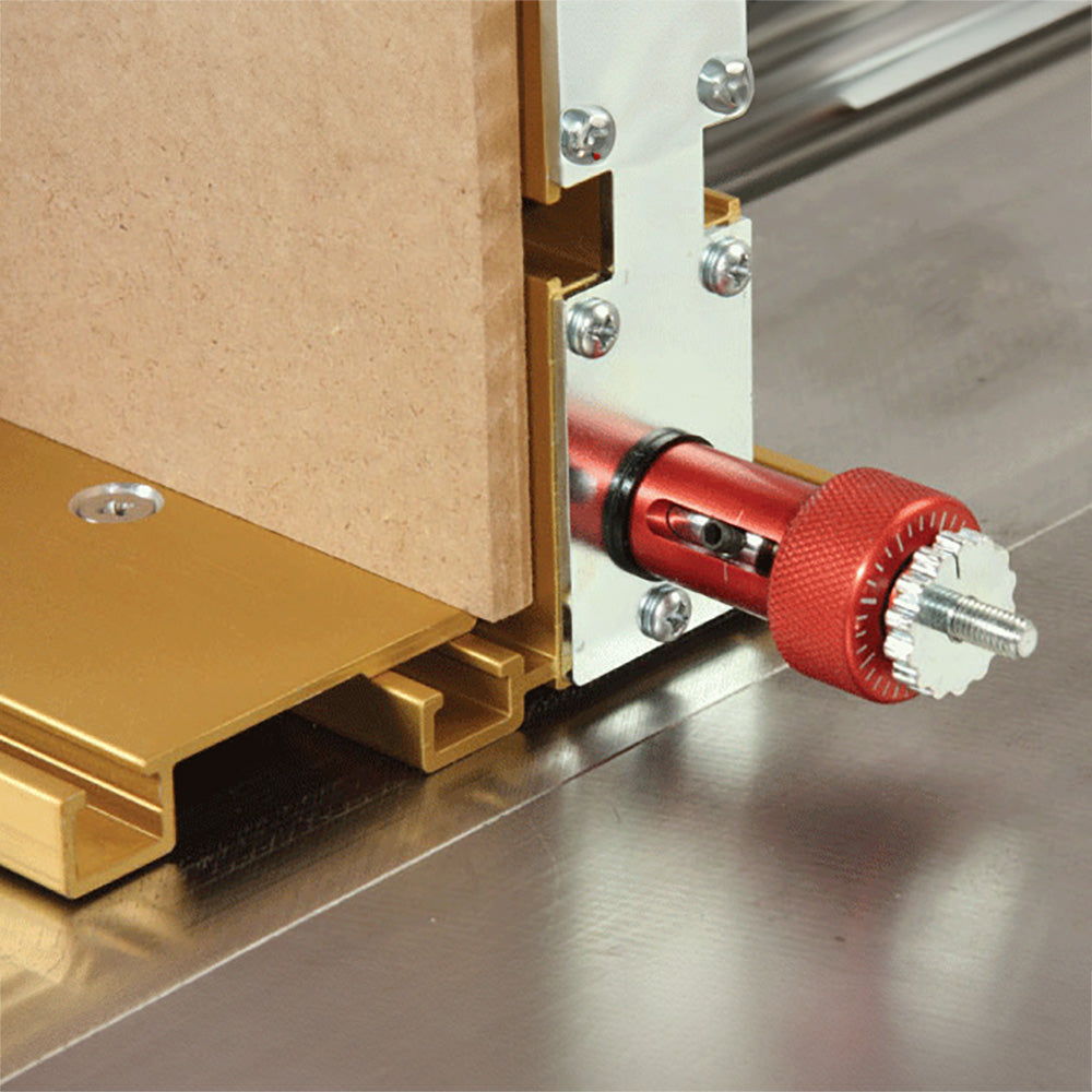 Router table fence with micro-adjustment knob and MDF panel on a woodworking tool base