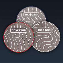 Set of three round diamond sharpening discs labeled DC 300, DC 600, and DC 1200 on dark background
