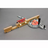 Precision woodworking miter gauge with adjustable fence and measurement scales on gray surface