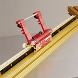 Router table fence with adjustable Incra stop and measuring scale for woodworking precision