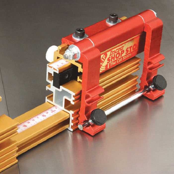Aluminum woodworking fence stop block with measuring scale on a metal router table