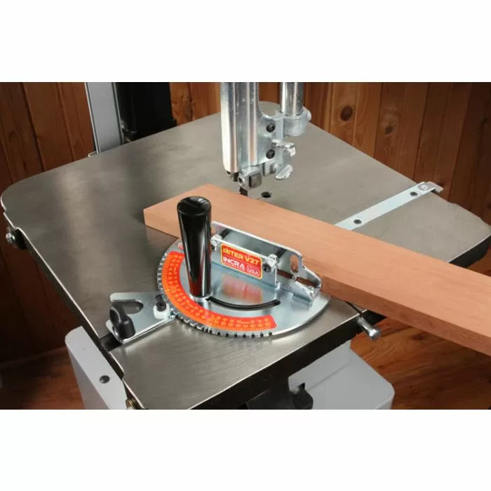 Bandsaw with angle miter gauge and wood board, woodworking precision tool setup