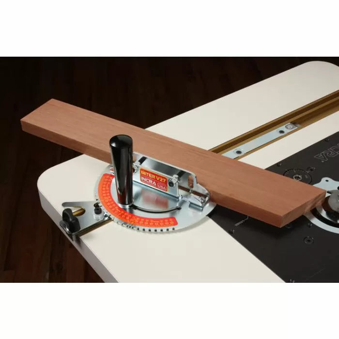 Router table with INCRA miter gauge and wooden board, precision woodworking tool