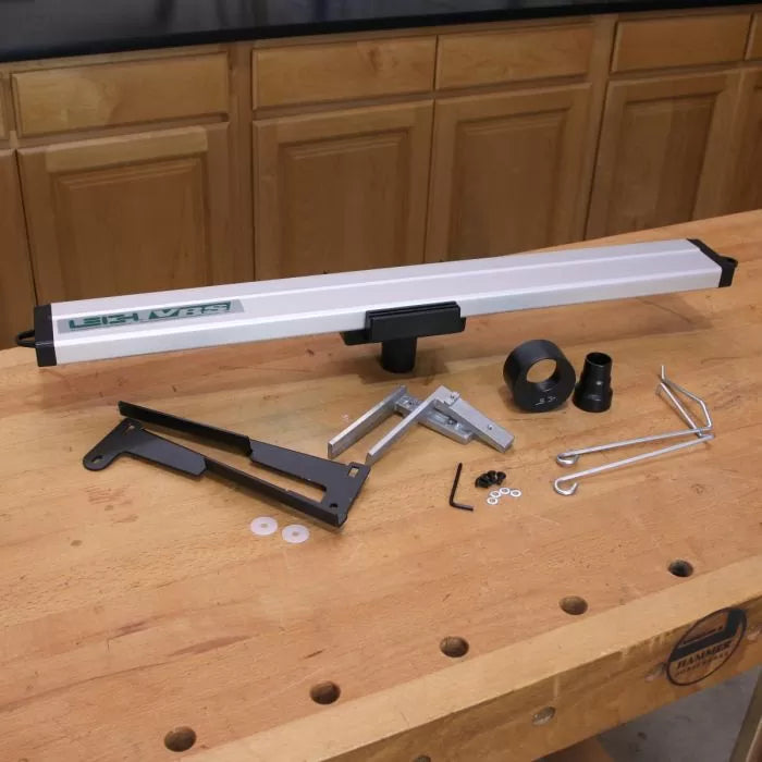 Router table fence kit with aluminum fence and accessories on a woodworking bench