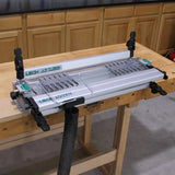 Leigh D4R Pro dovetail jig for woodworking mounted on a workbench in a workshop