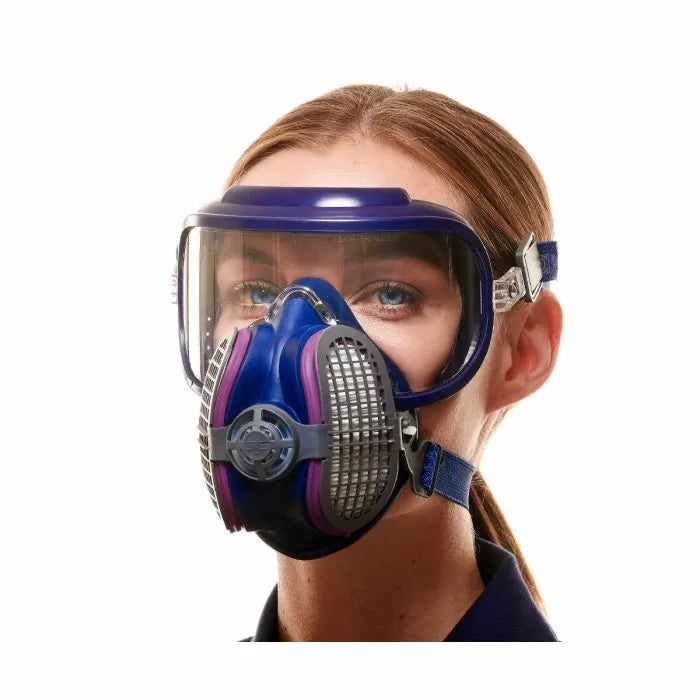 Woman wearing a full face woodworking respirator mask with clear shield and dual filters
