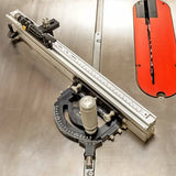 Precision woodworking table saw miter gauge with fence on metal saw table