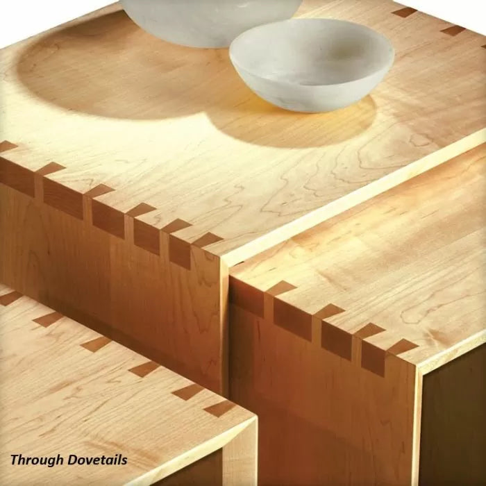 Close-up of wooden boxes showing precise through dovetail joints for woodworking projects