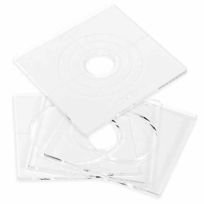 Set of clear square router table inserts with center openings for woodworking tools
