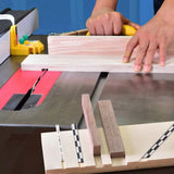 Woodworker using table saw sled to cut precise grooves in wood with inlay strips