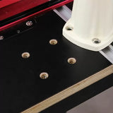 Router table top with inset threaded inserts and metal fence for woodworking tools