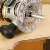 Woodworking router with roundover bit cutting MDF table edge