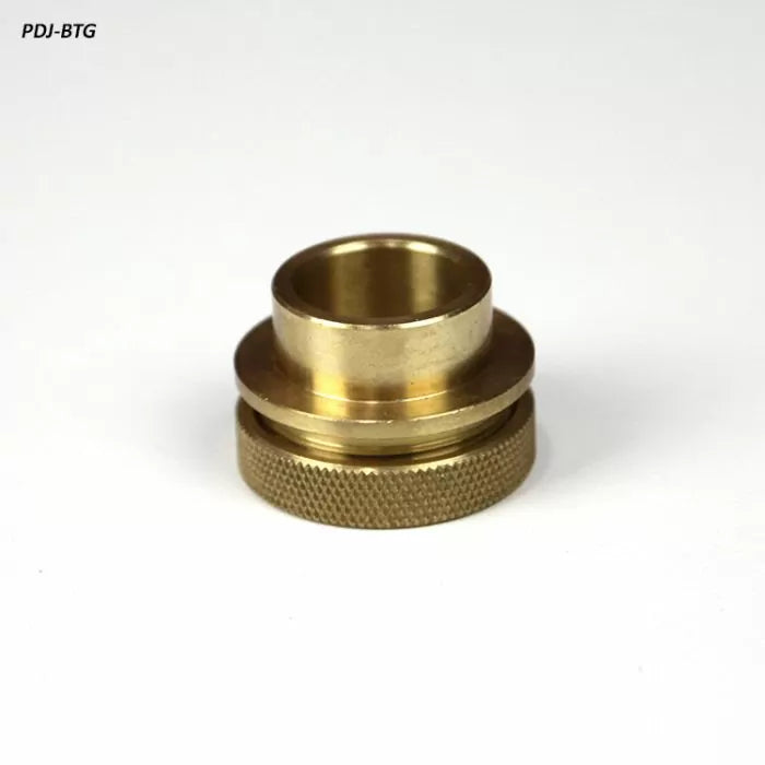 Brass router table guide bushing with knurled edge on white background