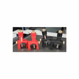 Precision woodworking router lift mechanisms in red and black on a workshop table