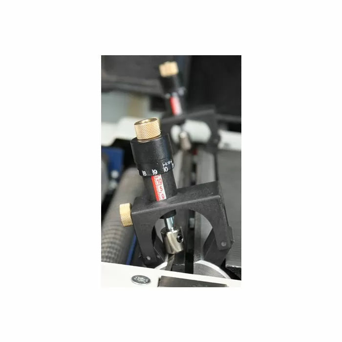 Precision planer height gauge with adjustment knobs on woodworking machine