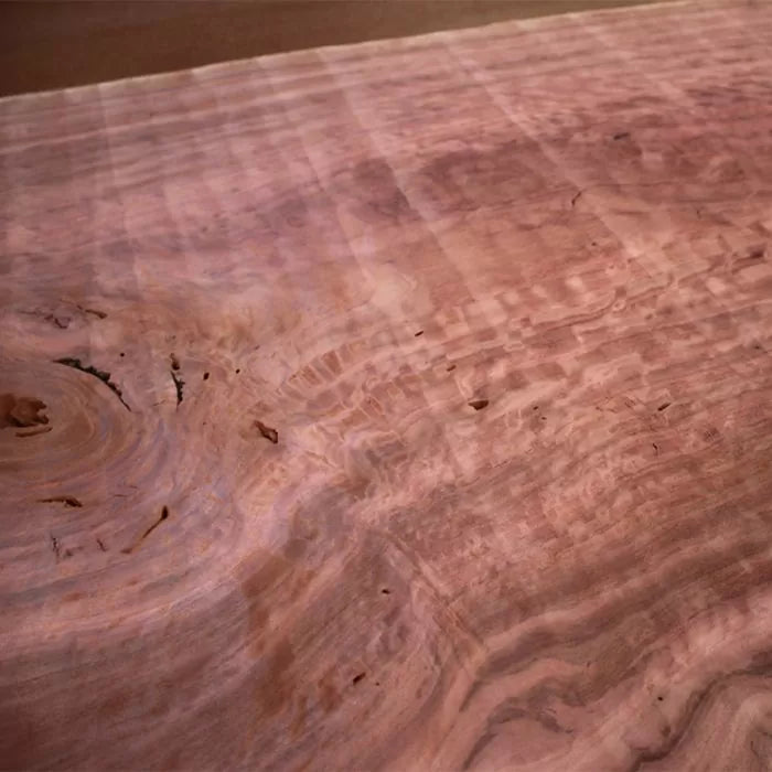 Figured hardwood slab with natural grain patterns for woodworking projects