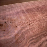 Figured hardwood slab with natural grain patterns for woodworking projects