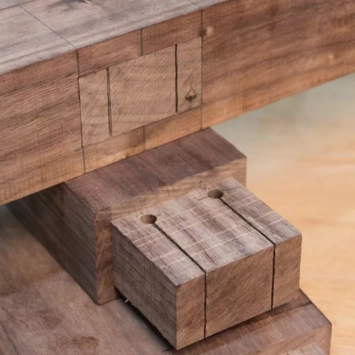 Close-up of a woodworking mortise and tenon joint in unfinished hardwood
