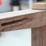 Close-up of a clean mortise joint in a wooden board, woodworking precision detail