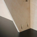 Close-up of plywood joint with pocket holes for woodworking assembly