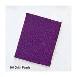 Purple 100 grit sandpaper sheet for woodworking, isolated on white background
