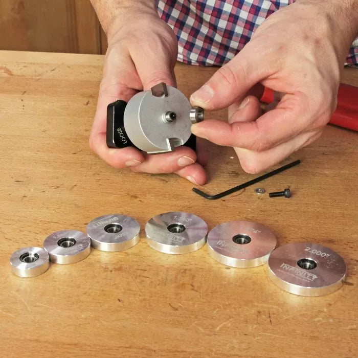 Router lift setup tool and aluminum gauge disks for woodworking on a workbench