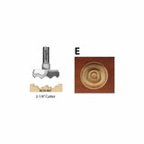2-1/8 inch woodworking router bit with decorative rosette sample cut in wood