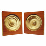 Pair of square hardwood rosette blocks with concentric circle details for woodworking