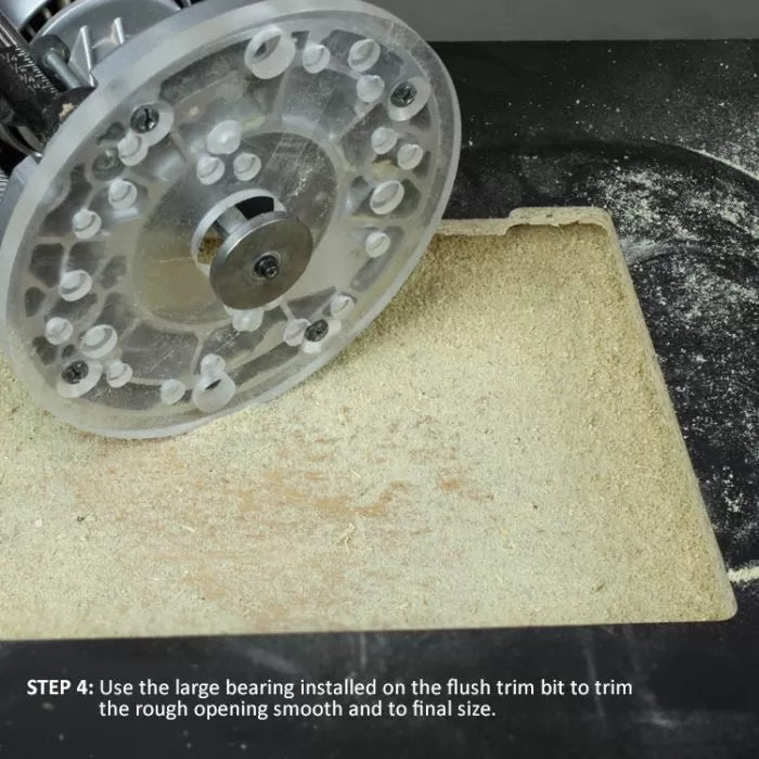 Router with flush trim bit smoothing a plywood edge surrounded by wood dust.