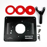 Router table insert plate kit with red rings, handle, screws, and hardware on white background