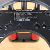 Close-up of pre-drilled router lift mounting plate with labeled holes for various router models.